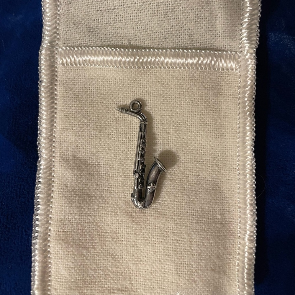 Vintage. Rare retired James Avery saxophone charm.